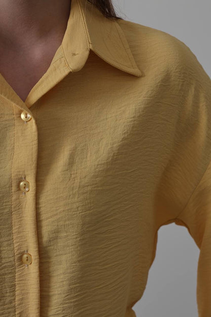 القميص المزموم ✨